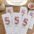 Une invitation d'anniversaire colorée créée avec des perles à repasser sur fond blanc.