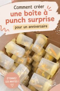 Boîte surprise colorée pour anniversaire d'un enfant, remplie de friandises et de jouets.